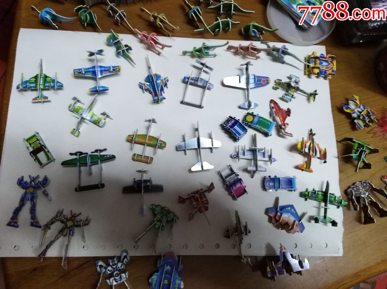 小灵龙积木卡叠成的小车玩具,玩具,飞机,变形金刚等一拼装恐龙作文500字图片