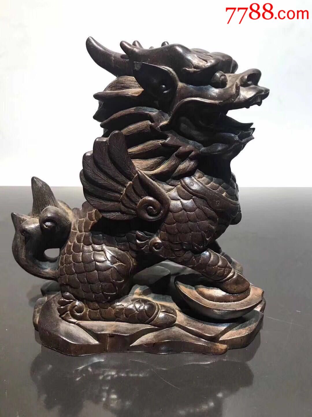 首页 零售 木雕摆件 >> 清末单只黄花梨麒麟雕工精美雕刻麒麟栩栩如生