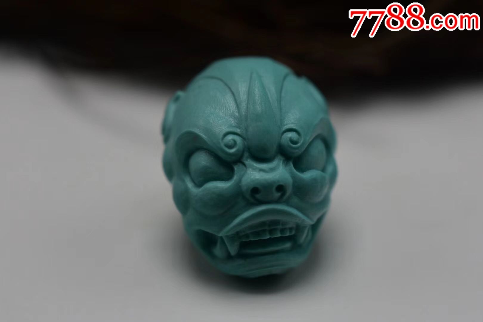 绿松石兽面背云