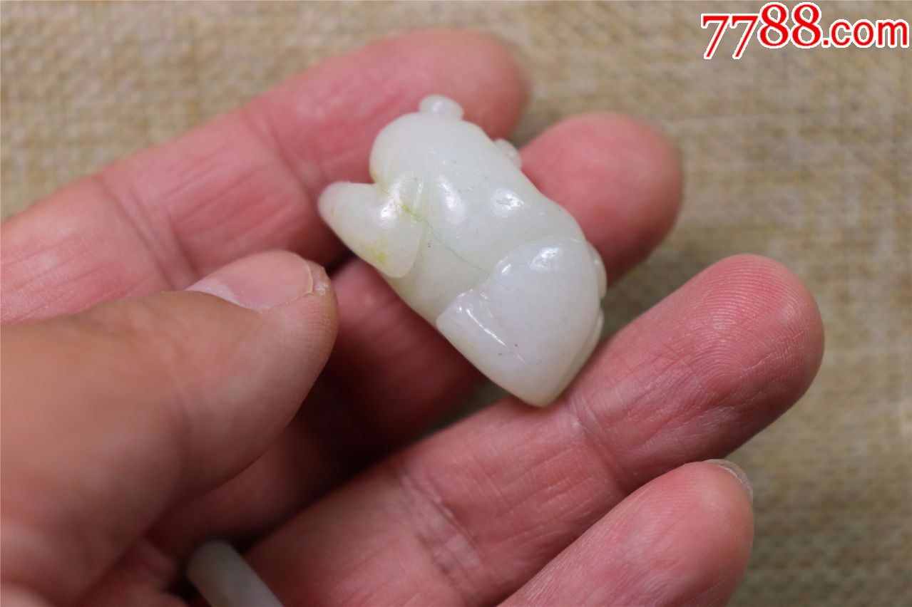 文物商店旧藏和田玉猫勒子