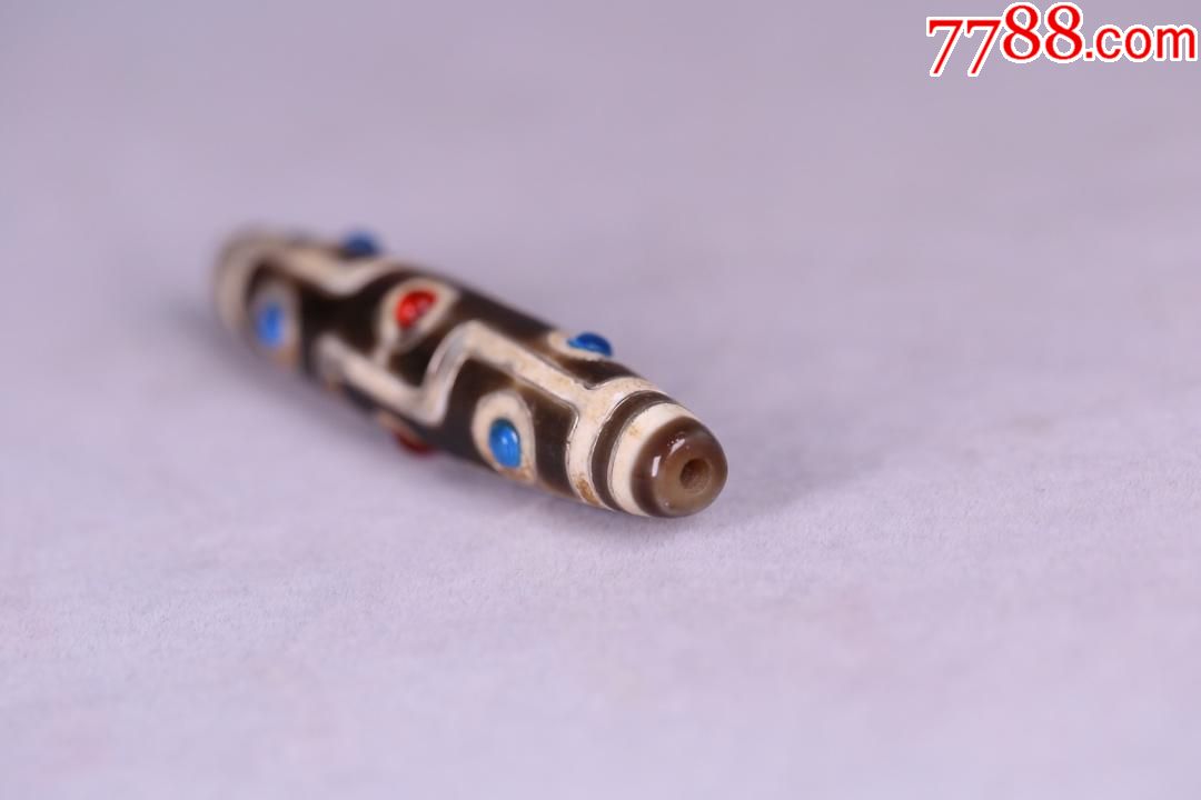藏传错银九眼天珠