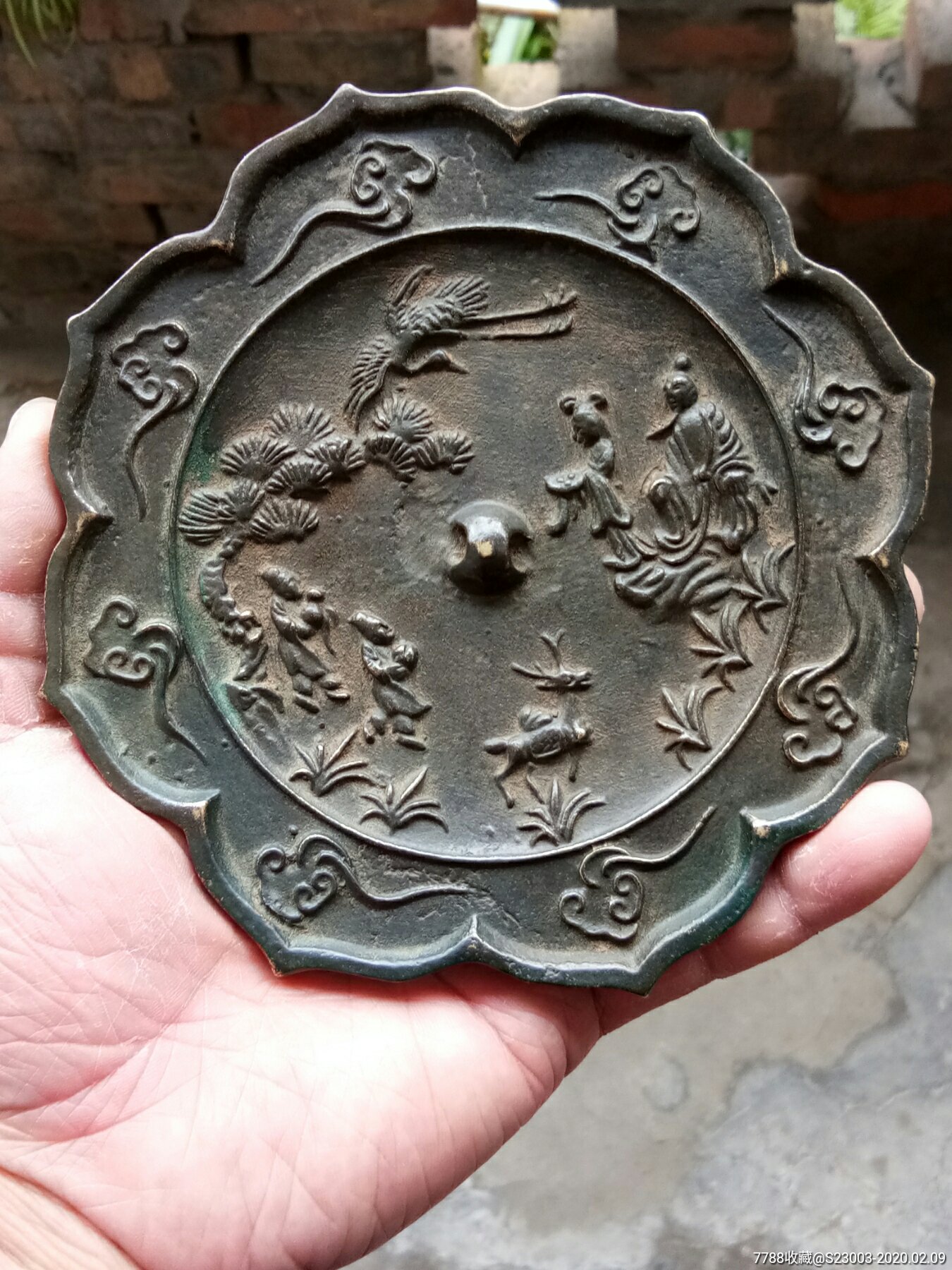 铜镜子一个仙鹤