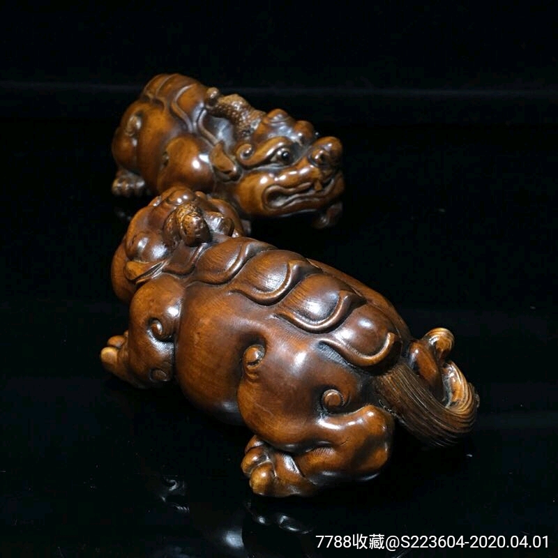 黄杨木雕貔貅一对尺寸:单个长约:9.8cm宽约:5cm高约:4