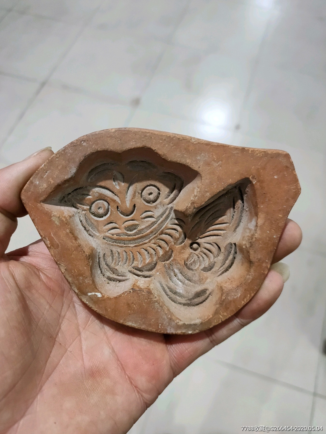红陶狮子狗面榼子