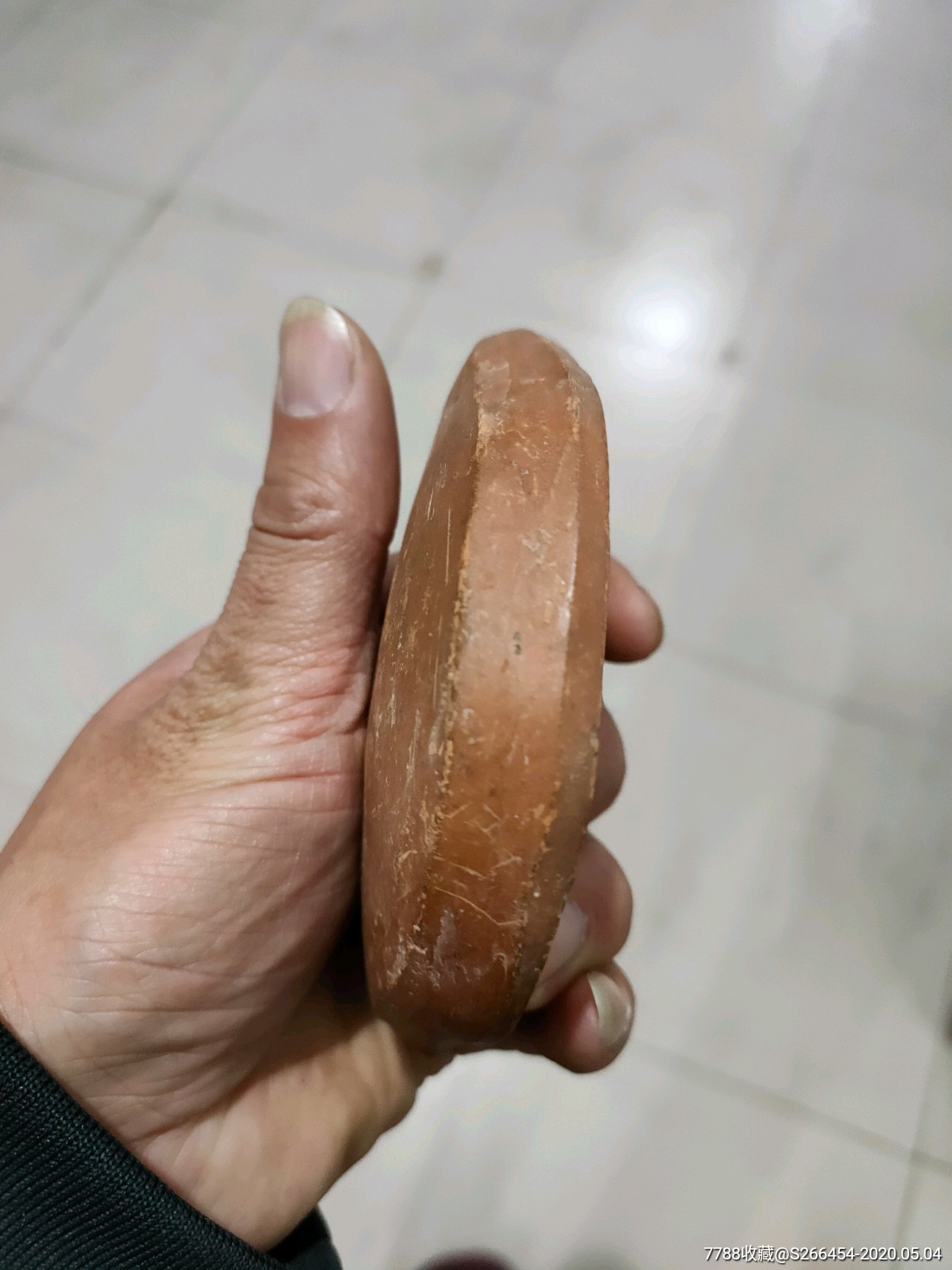 红陶狮子狗面榼子
