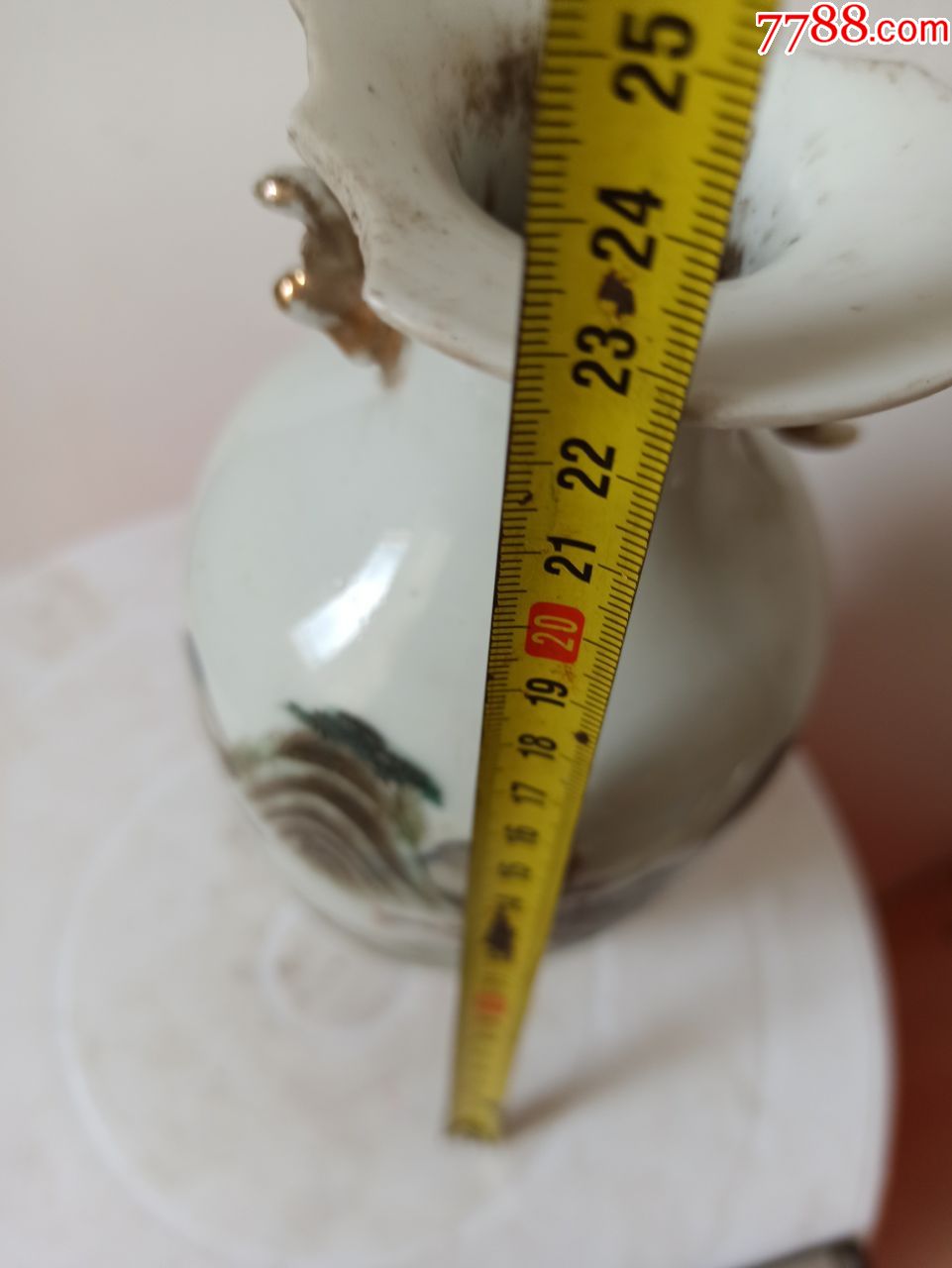 残破的瓶子,有冲线如图所示,高20厘米,直径9厘米