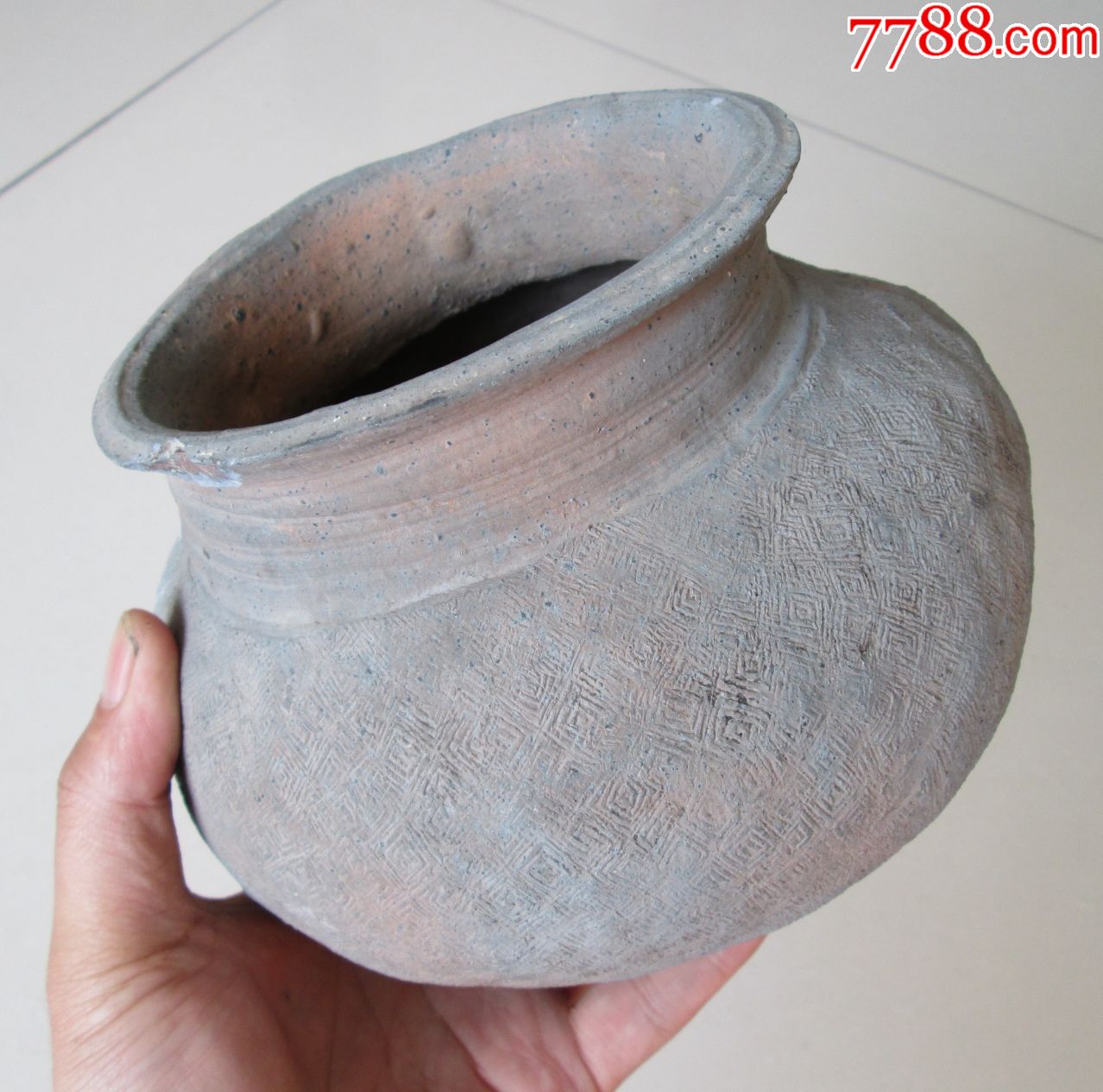 马桥文化夹砂陶印纹陶圜底内凹陶罐(中源夏商时期)