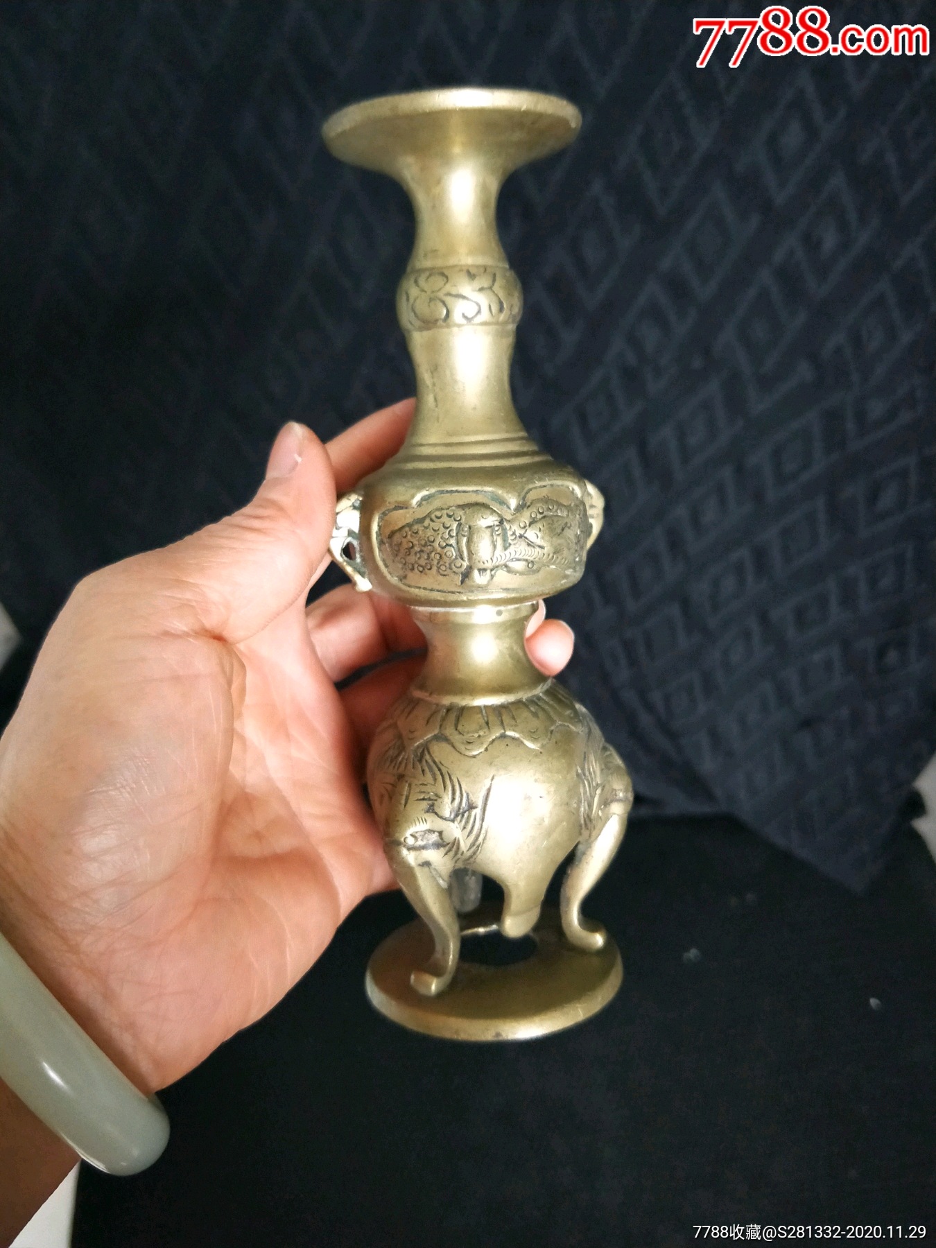 铜烛台一个