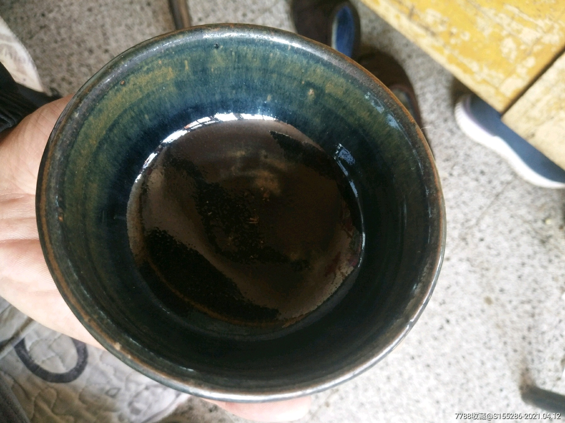 元代黑釉窑变茶盏,口径10.8厘米,器型端正,釉水发色一