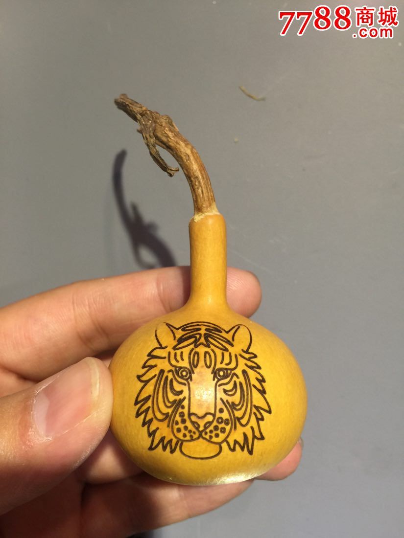 烫画虎头手捻葫芦