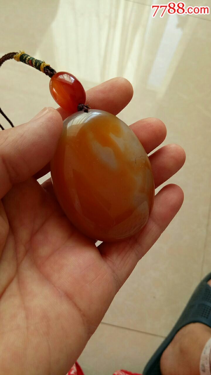 巴西飘花玛瑙手把件