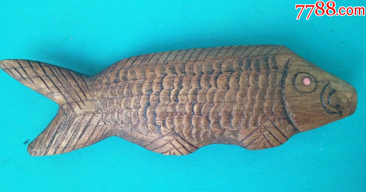 清代木雕鱼型缠线板
