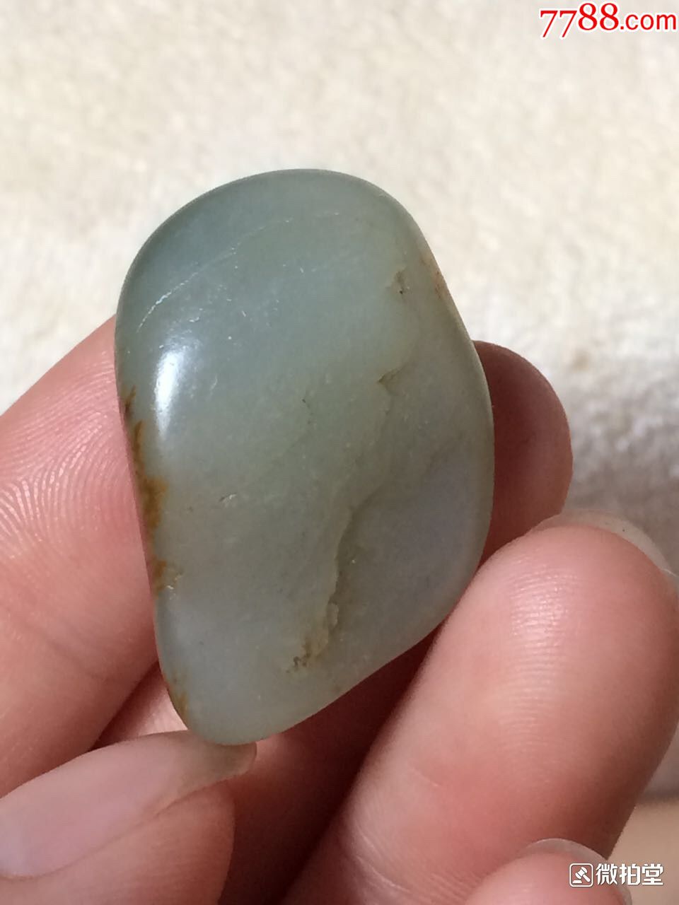 新疆和田玉聚枣红皮翠青籽料