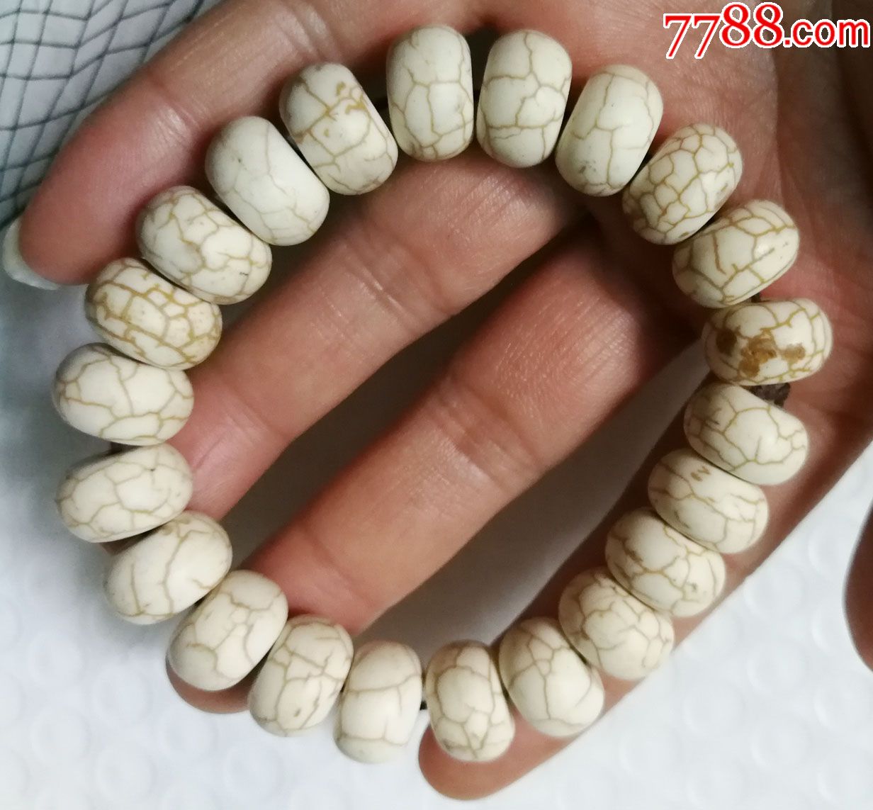 白松石头手串一个