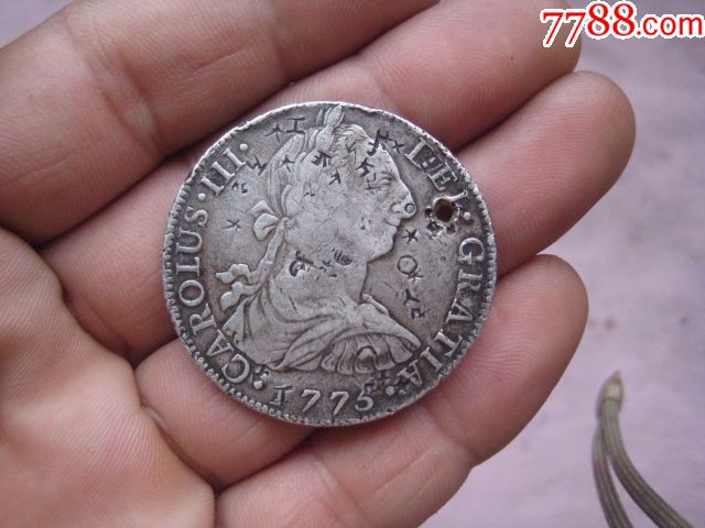 一枚可惜了的1775年双柱外国银币