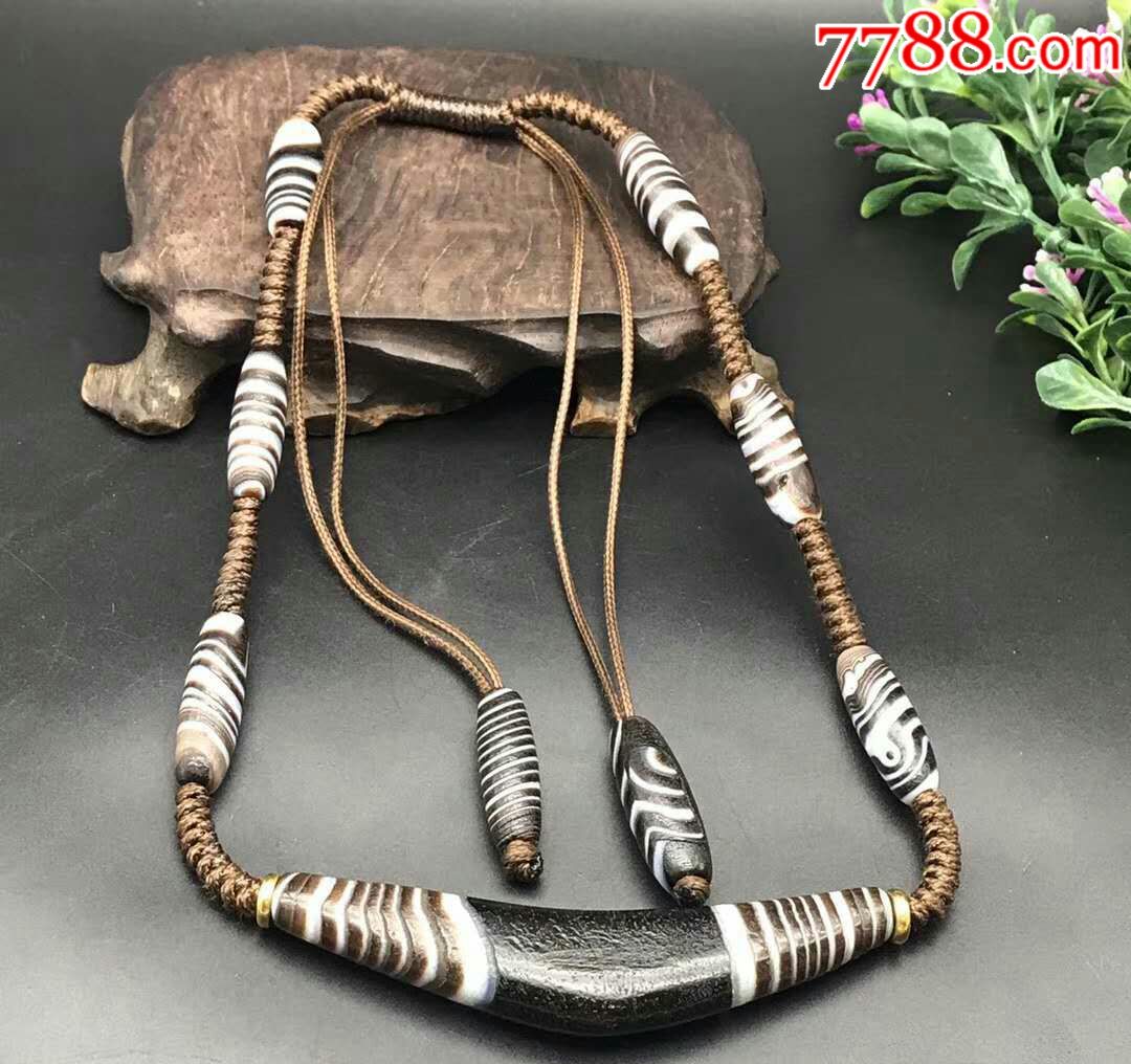 缠丝玛瑙牛角天珠