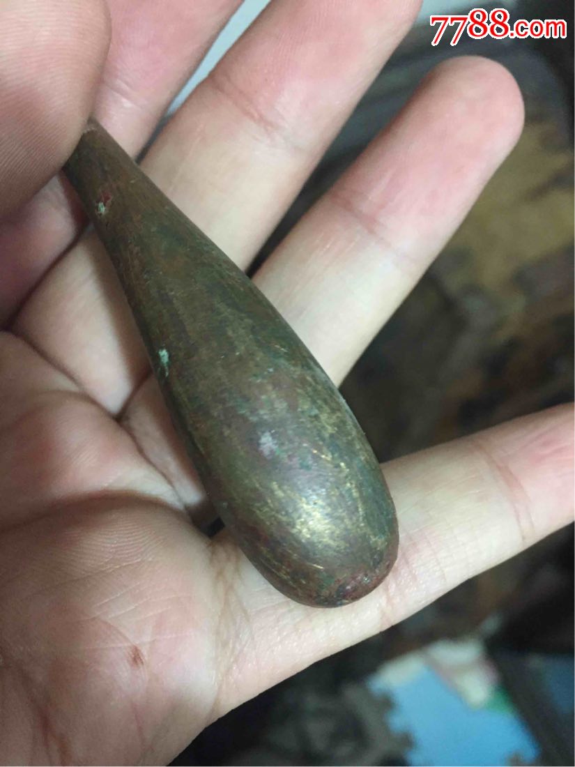 出土镀金青铜带钩一个