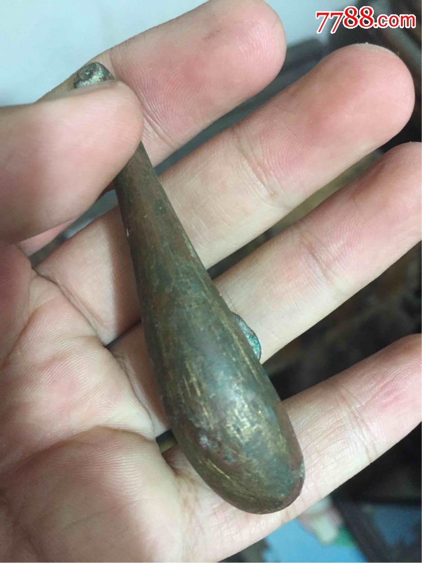 出土镀金青铜带钩一个