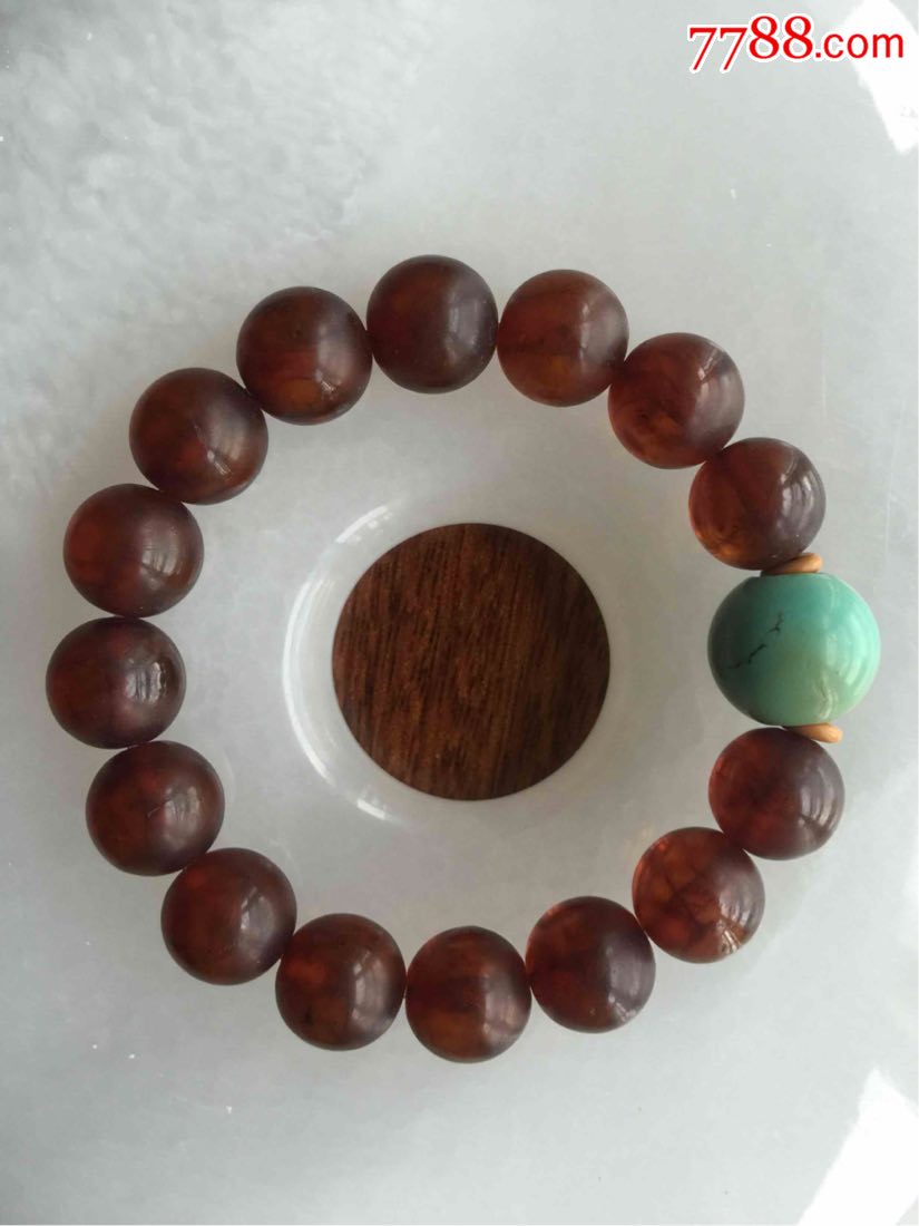 创汇期血珀手串顶珠配绿松