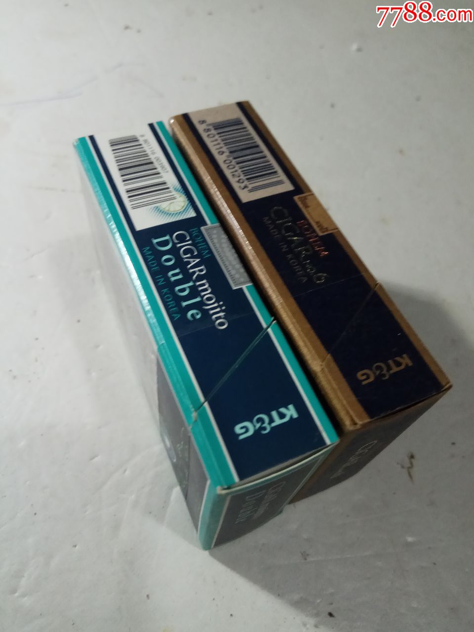 蓝绿色烟盒图片