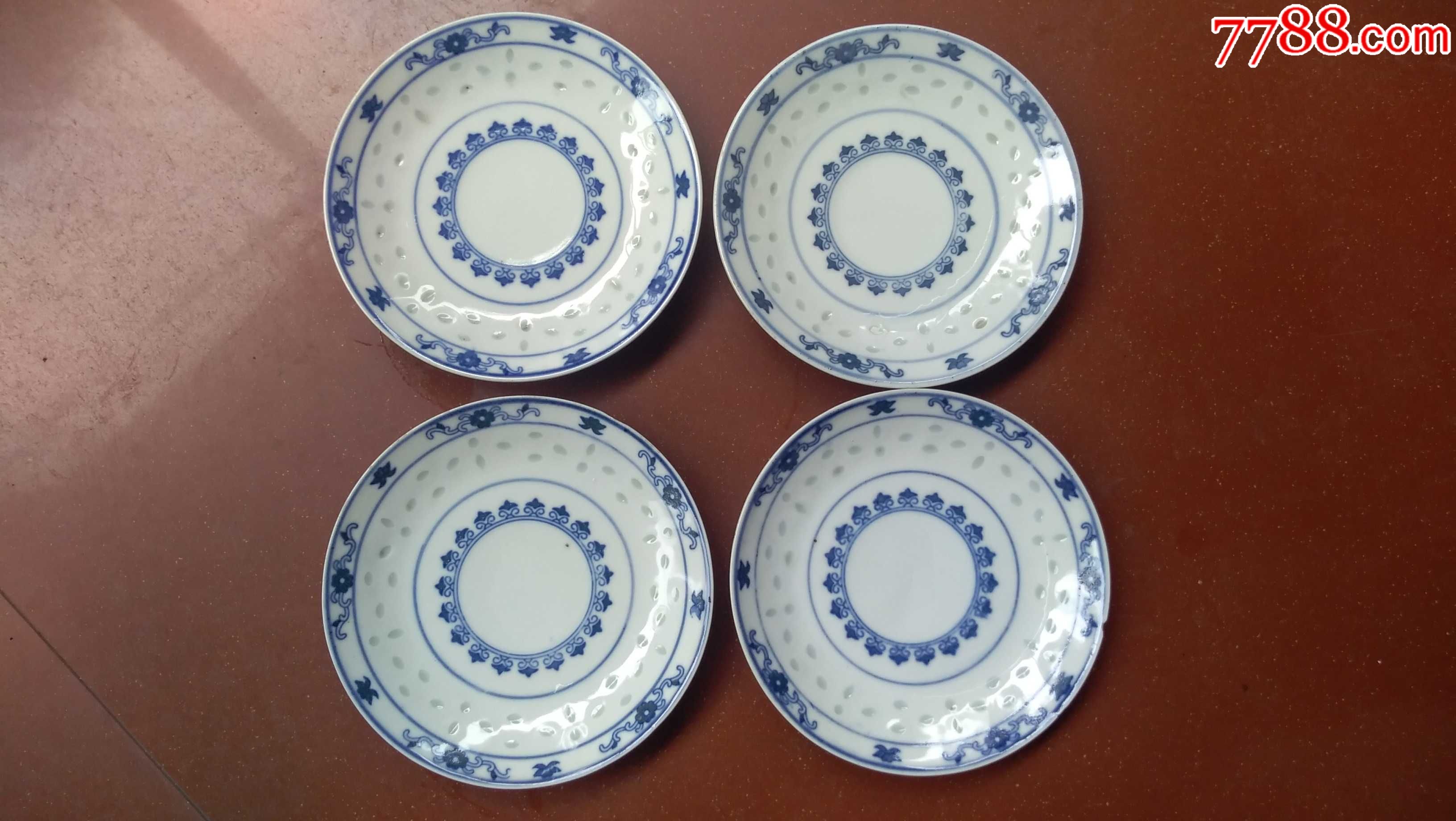 "中国景德镇制"款花卉纹玲珑瓷碟子四个