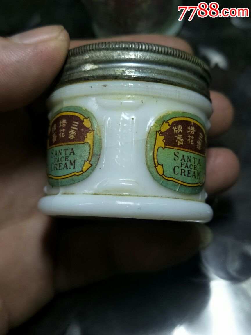 白瓶绿盖的雪花膏图片