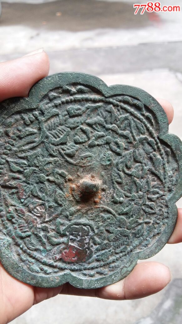 辽金锭型款花卉铜镜