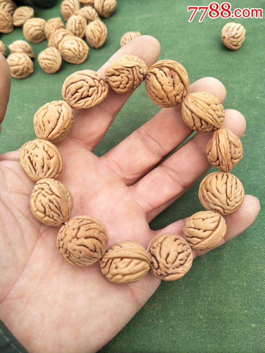野生暴龙纹桃核手串特价_文玩核桃_第1张_7788核雕收藏