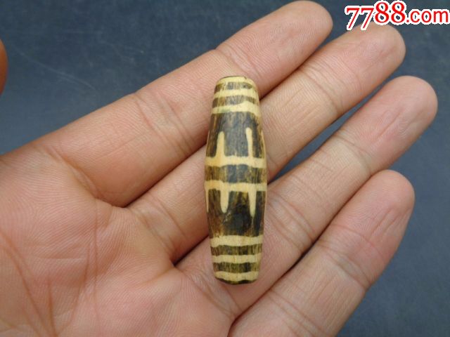 老邦迪克木化石镶蚀珠一个