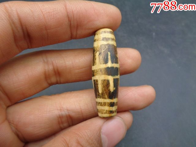 老邦迪克木化石镶蚀珠一个