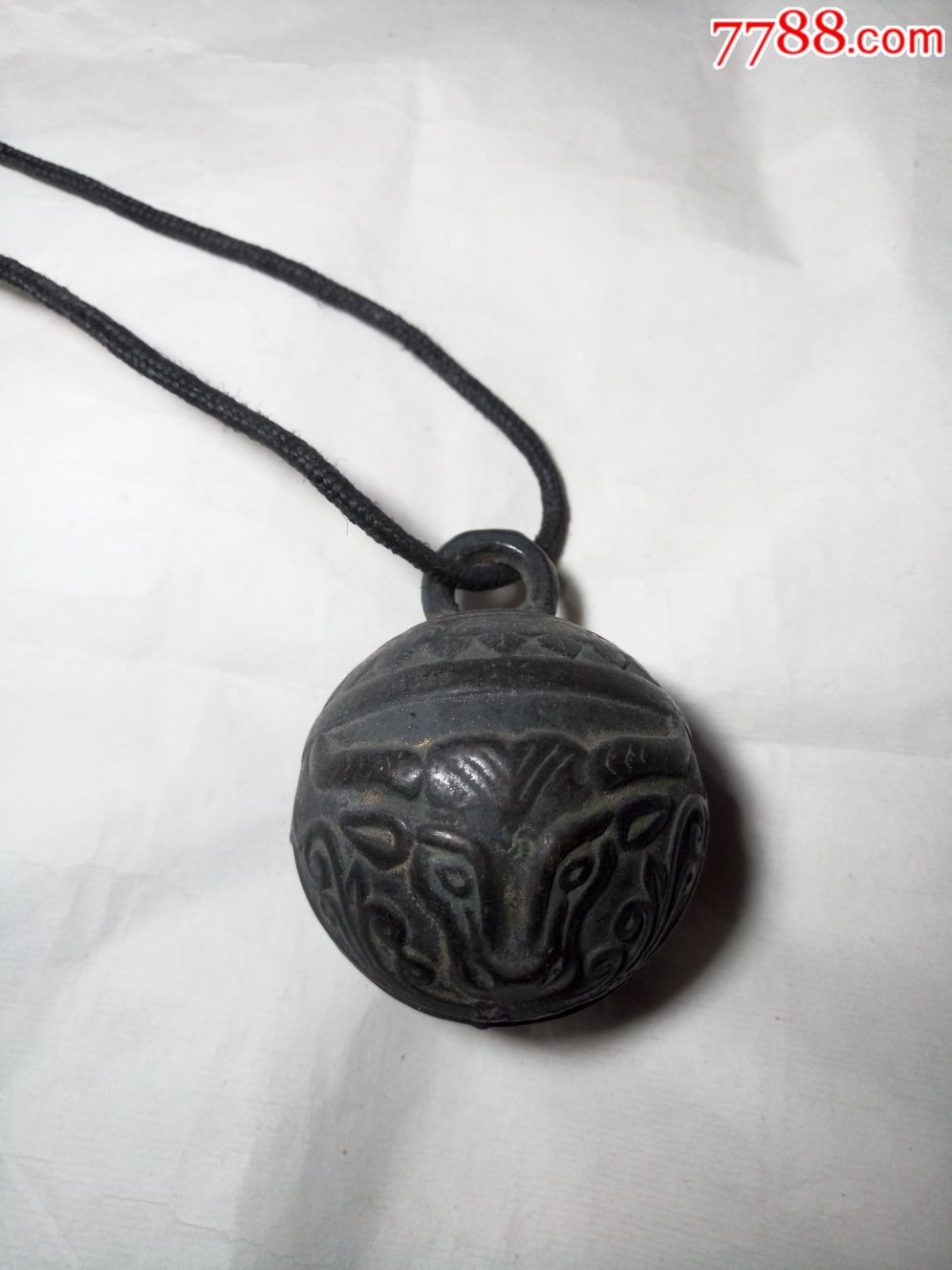 仿品牛头兽面铃铛一个