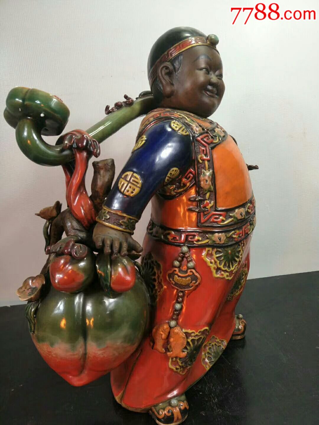 民国时期地主老财摆件一个.