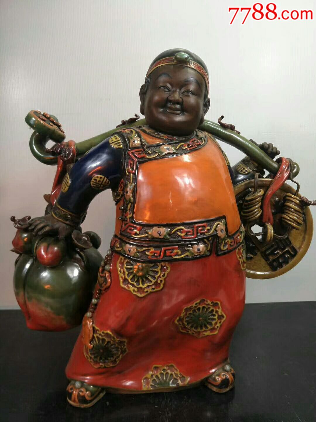 民国时期地主老财摆件一个.