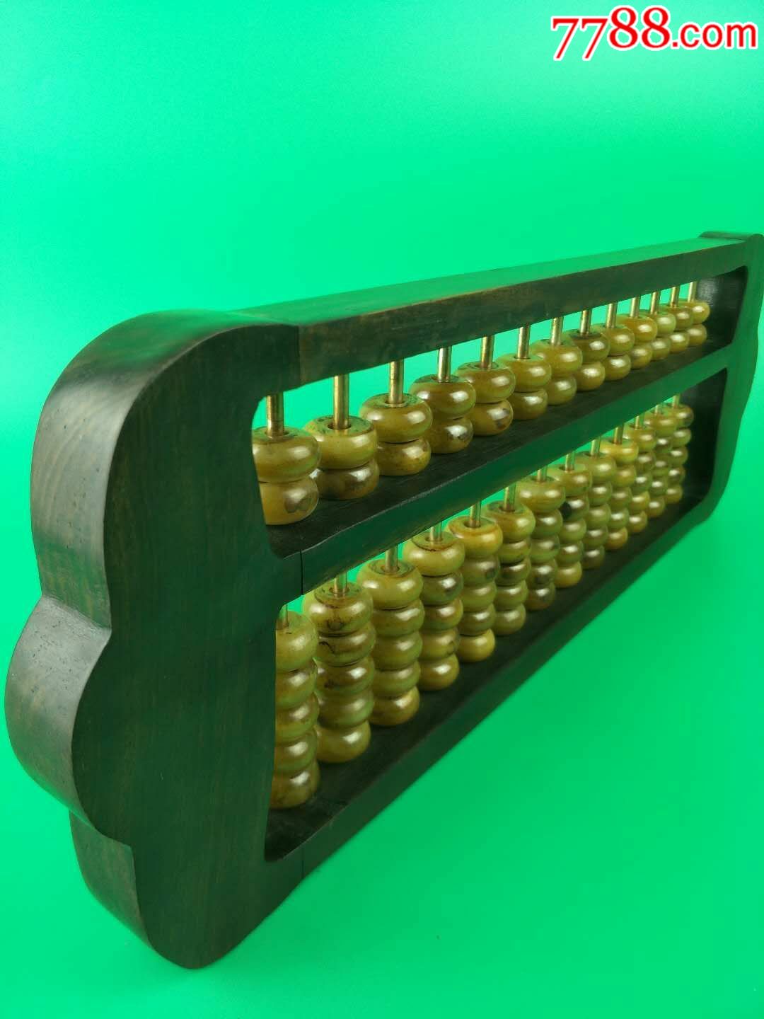 清代檀木框和田玉珠算盘一件.