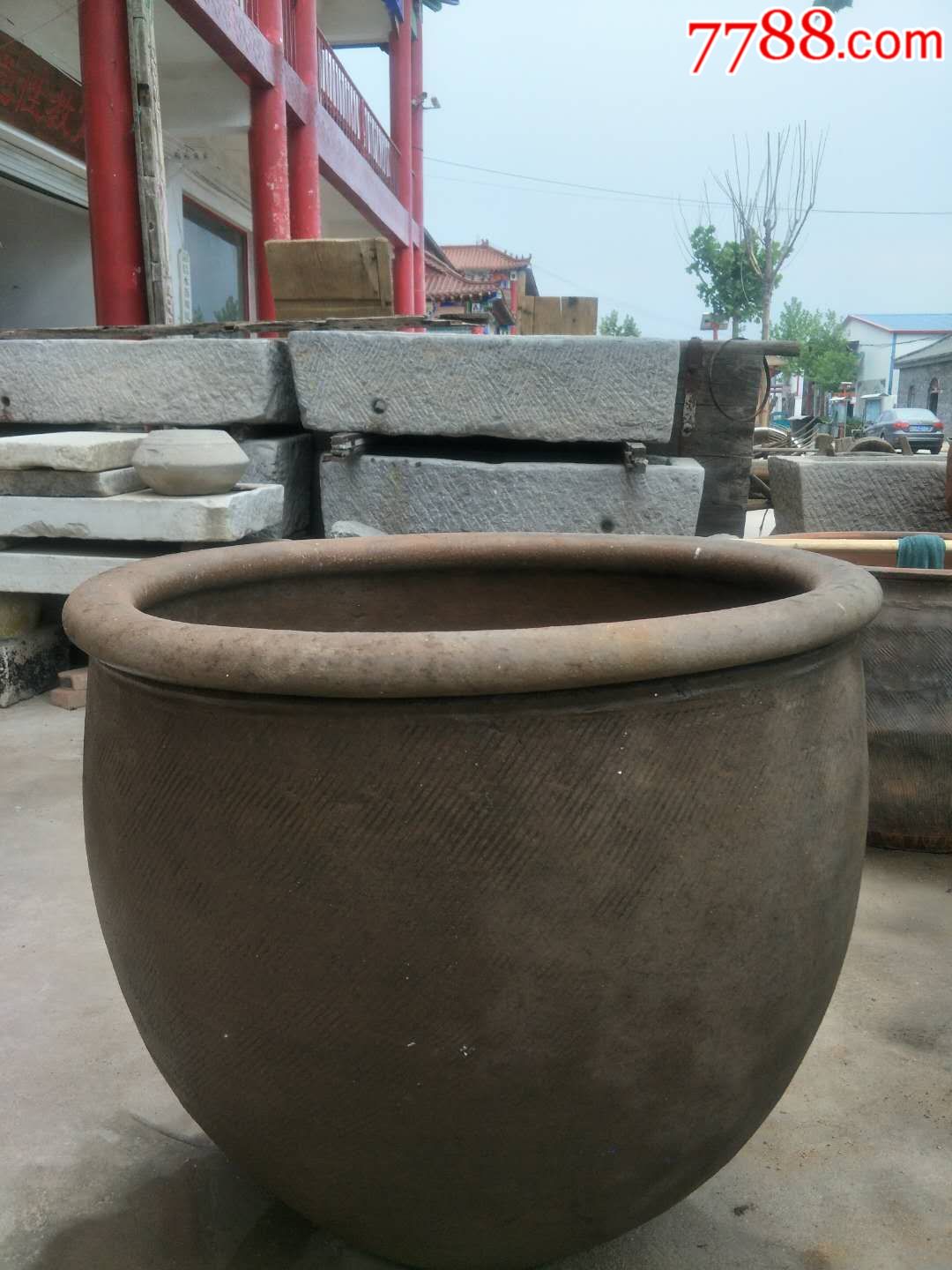 陶缸风水缸-吉祥缸但凡有庭院的中国住宅,总有一口老缸明晃晃地摆在院