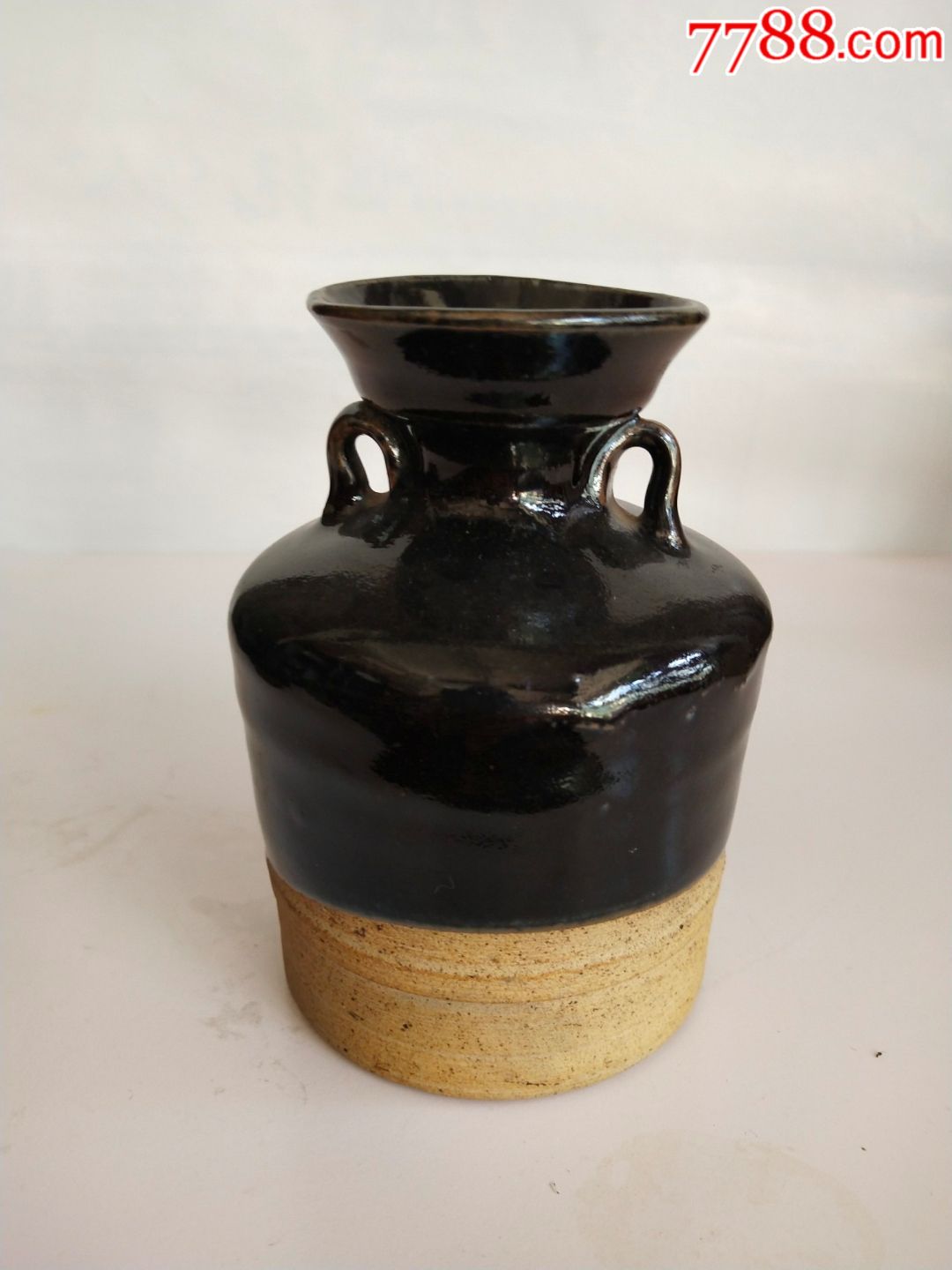 明代黑釉双系盘口瓶