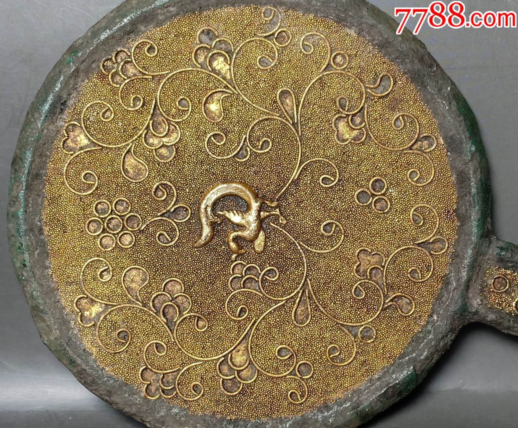 唐代鎏金手执镜-铜镜-7788收藏