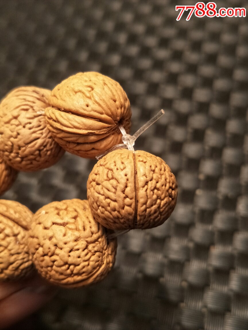 1.8蚂蚁纹偏头凤尾脐桃核手串