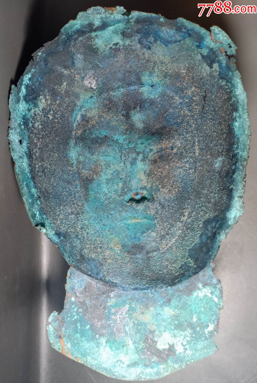 辽代早期铜鎏金面具