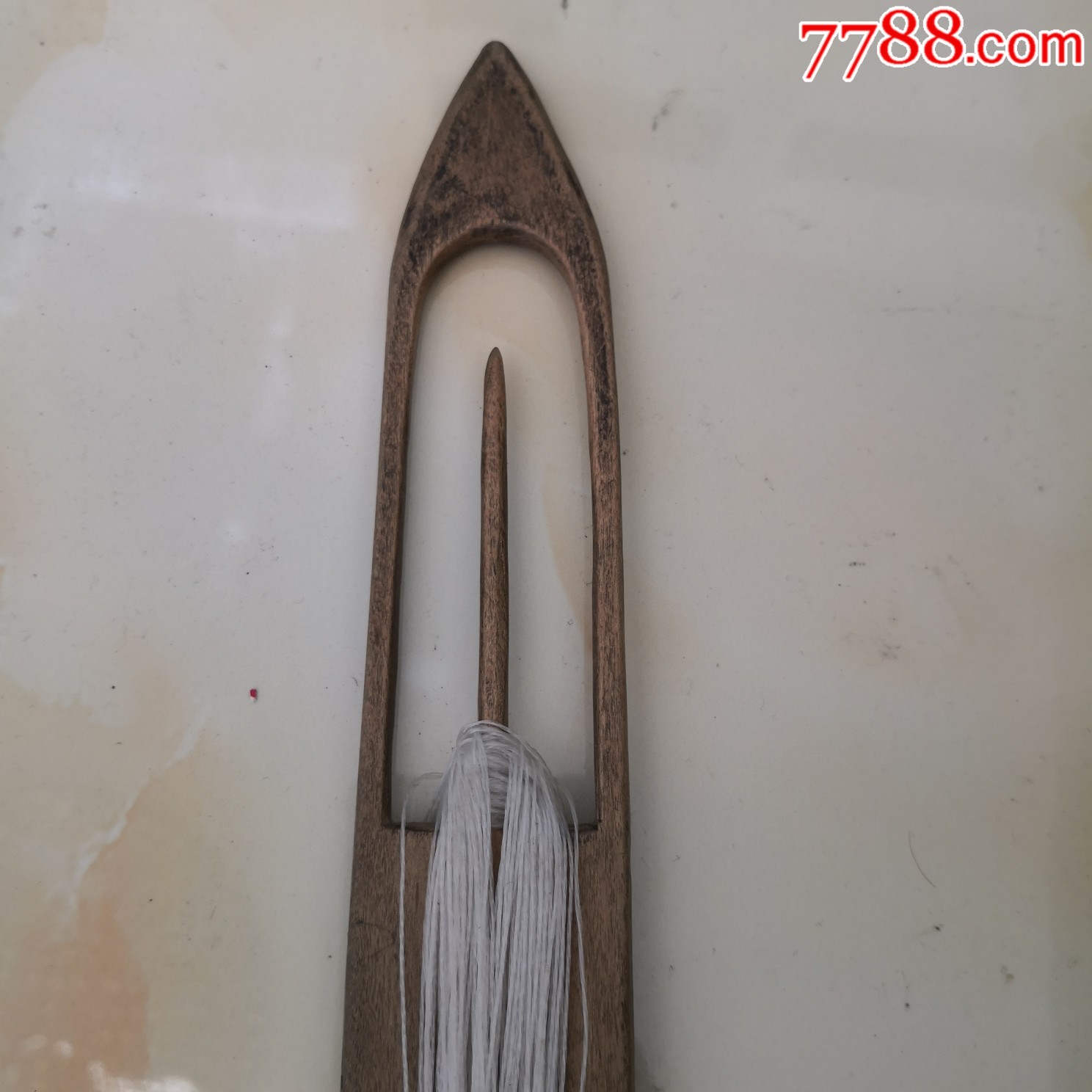 老民俗,木梭梭子带线