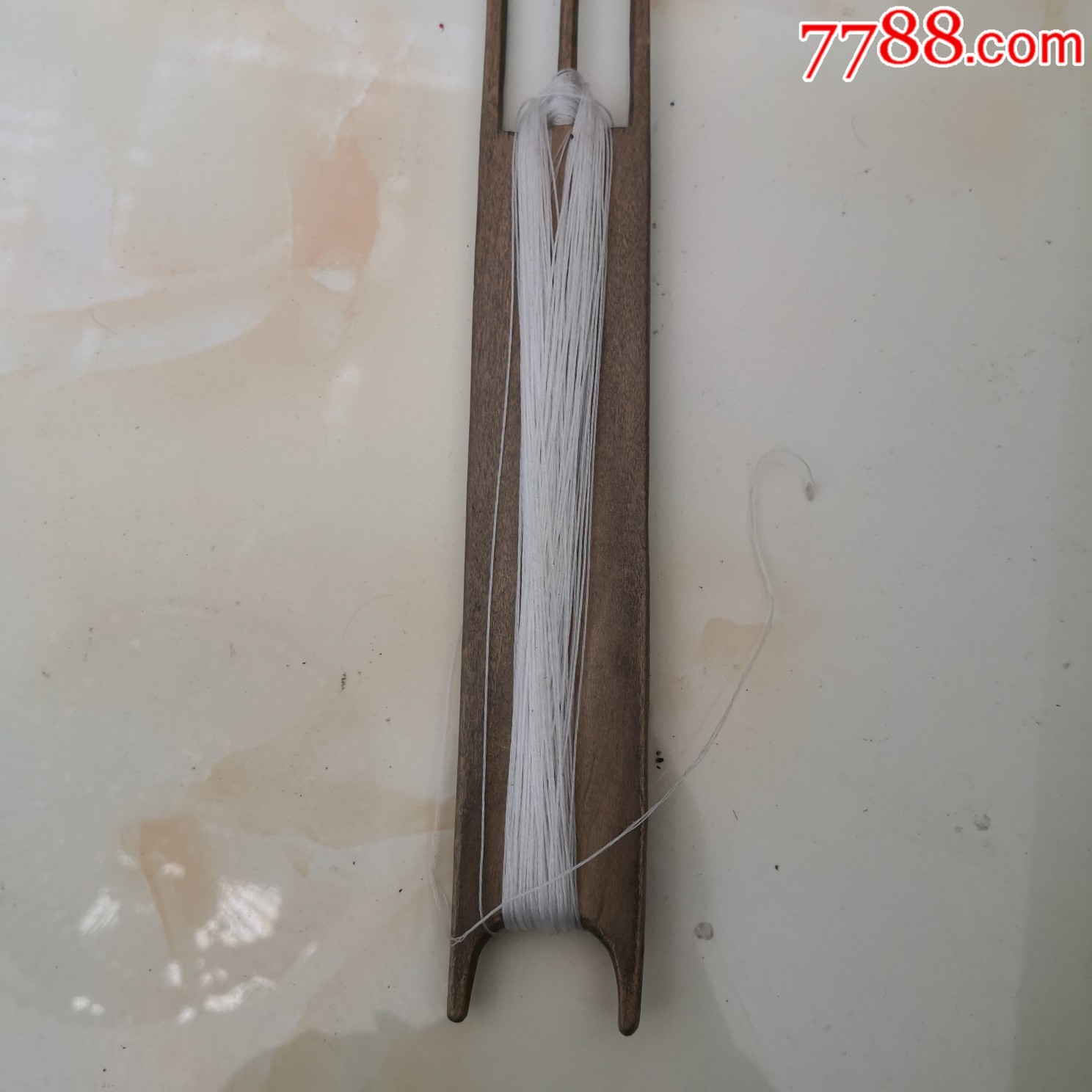 老民俗,木梭梭子带线