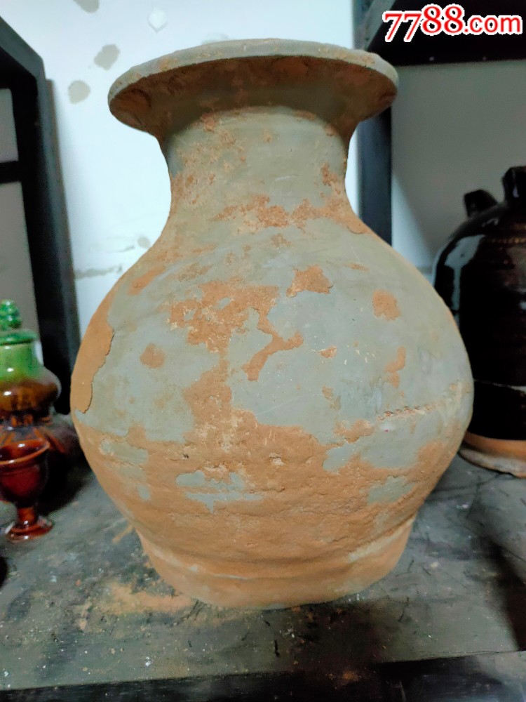 带瓦当的灰陶罐