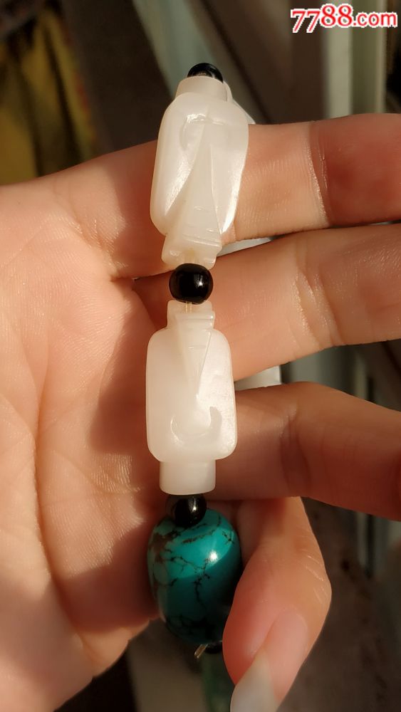 爷爷古玩店不干了特价处理新疆和田玉白玉翁仲手串总重44克自然光手机