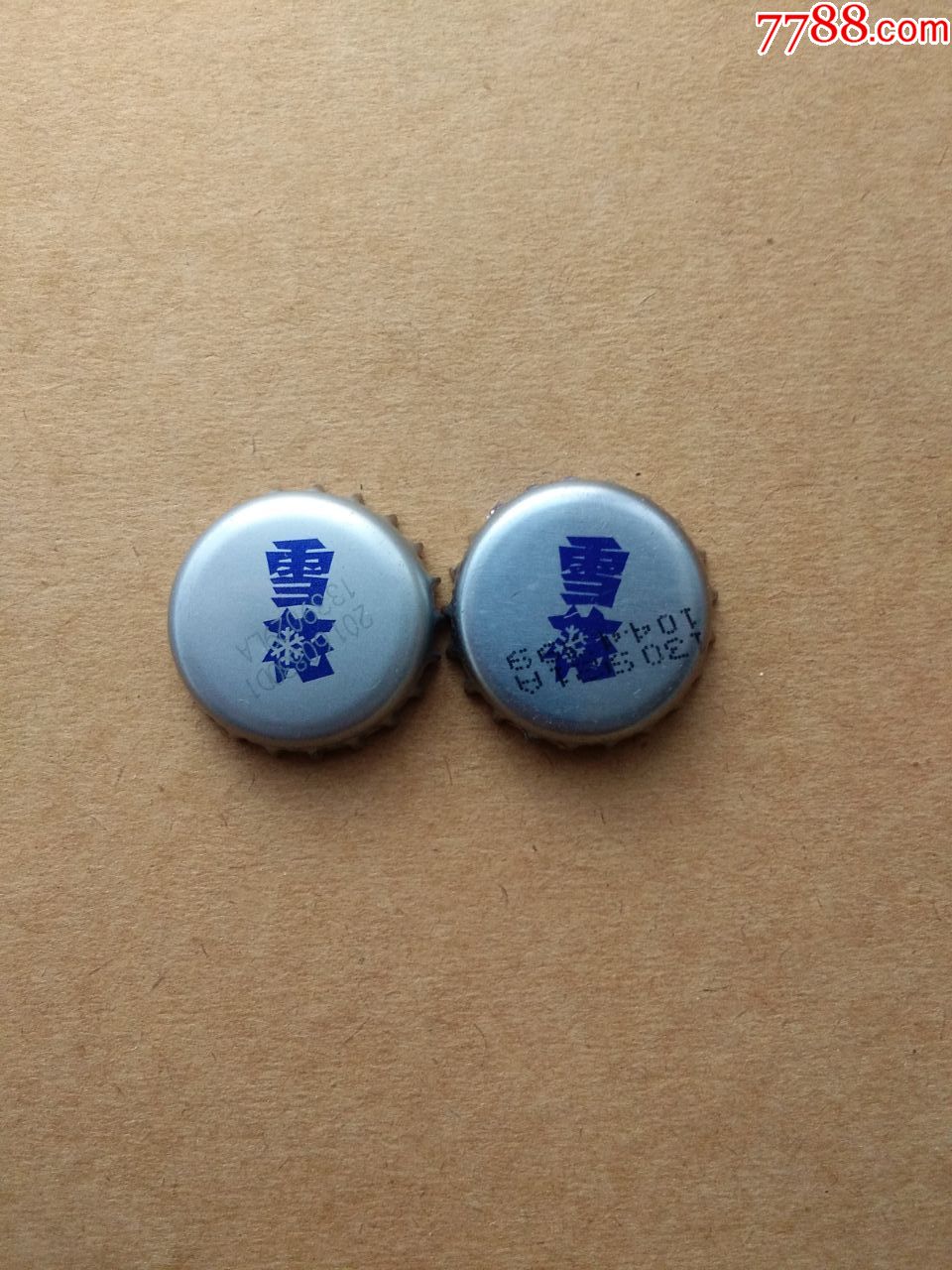 雪花啤酒瓶盖卖第二个亮面的
