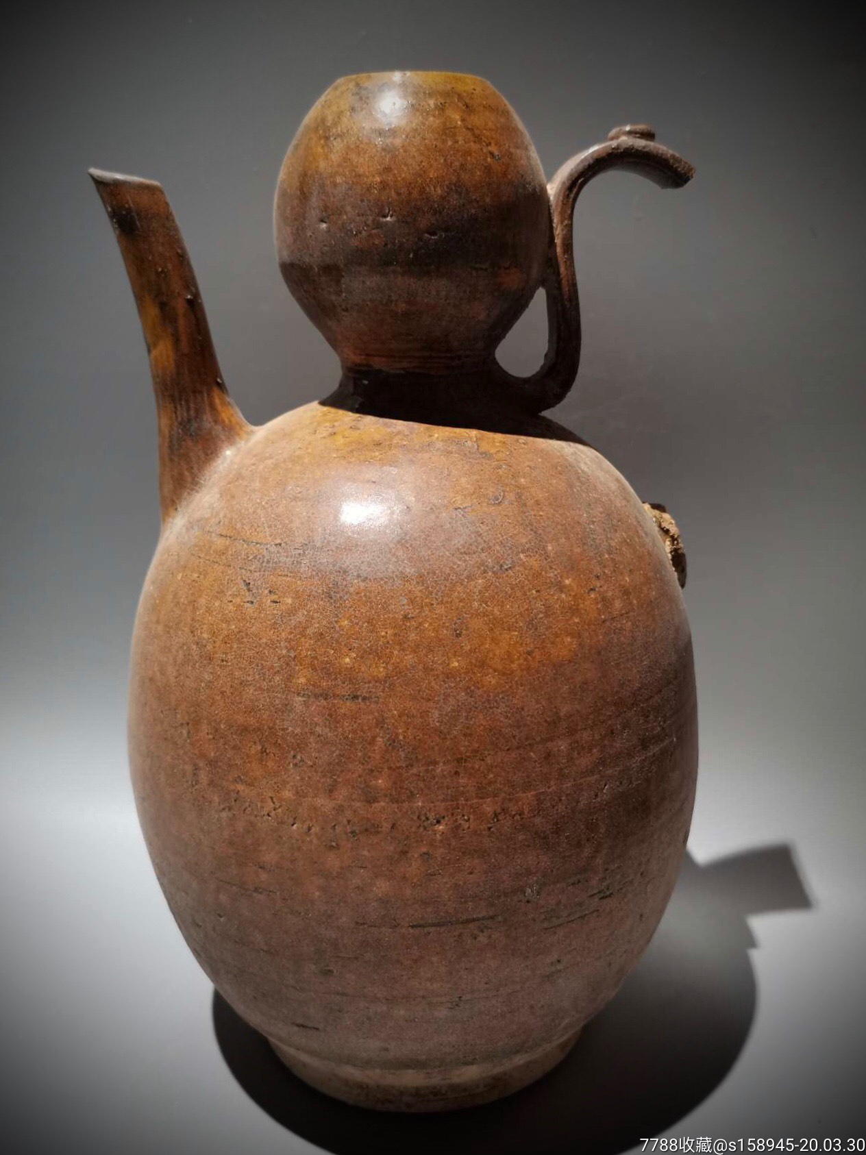 唐代一道黄釉葫芦型手执壶