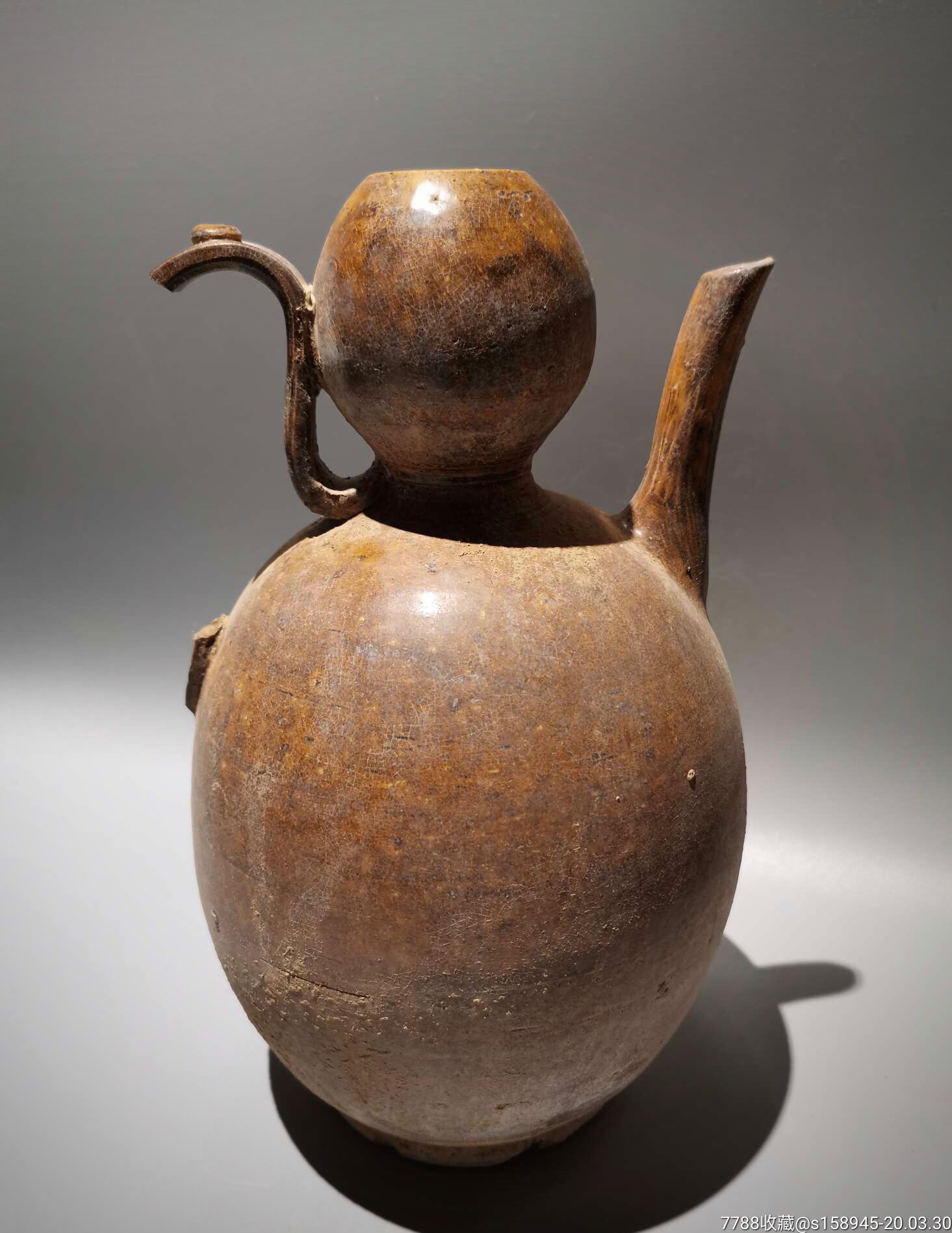 唐代一道黄釉葫芦型手执壶