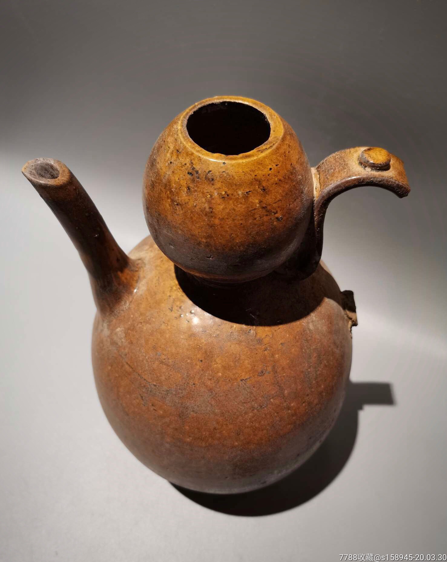 唐代一道黄釉葫芦型手执壶