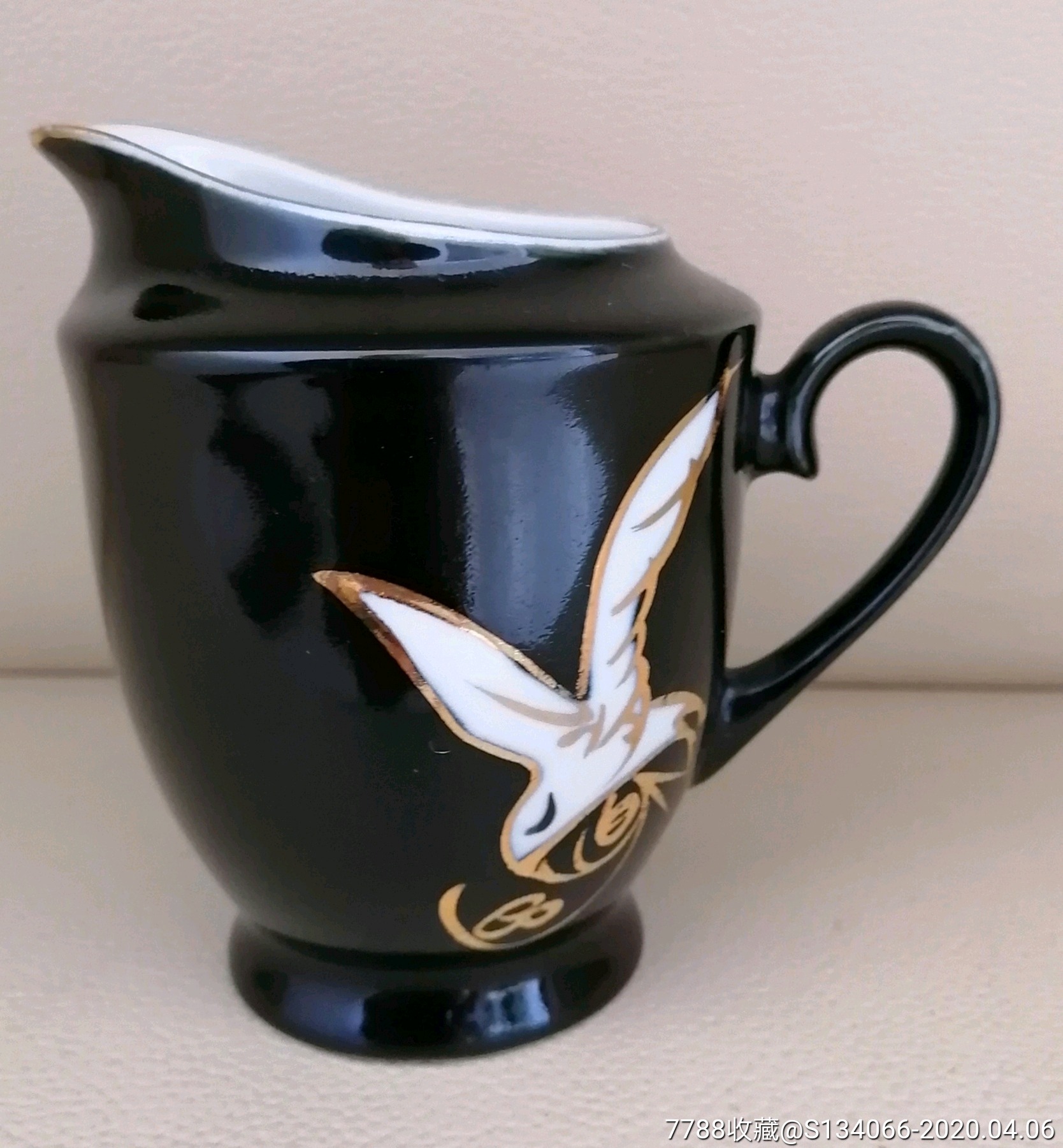 黑釉留白描金博山瓷杯