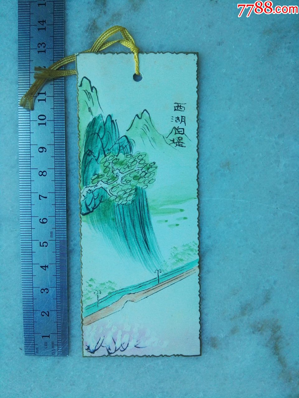 滚动鼠标滚轴,图片即可轻松放大,缩小更多"书签/藏书票