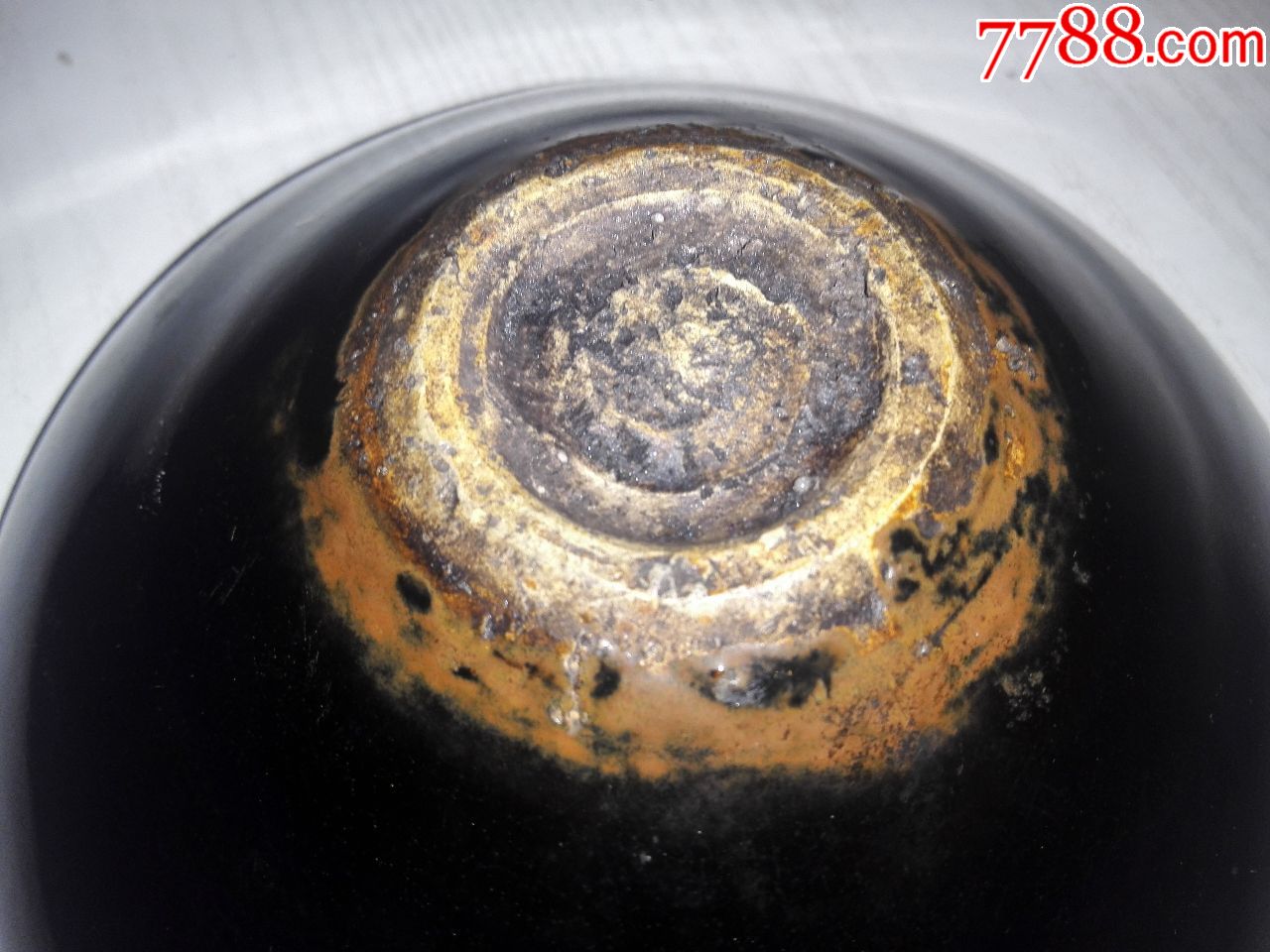 宋代定窑黑釉剔划莲枝花纹斗立碗